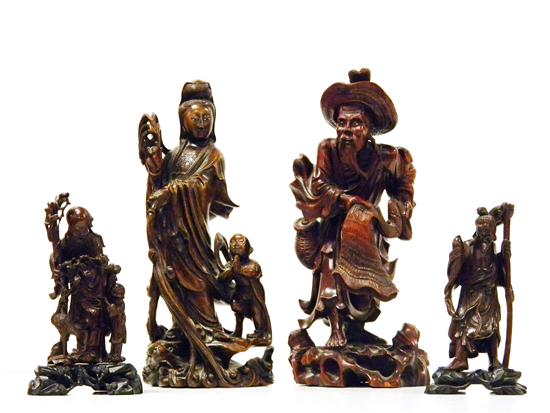 Four Asian wooden figures including  11172d