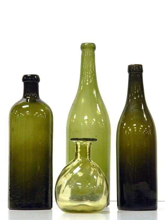 Four early glass bottles including  1117d6