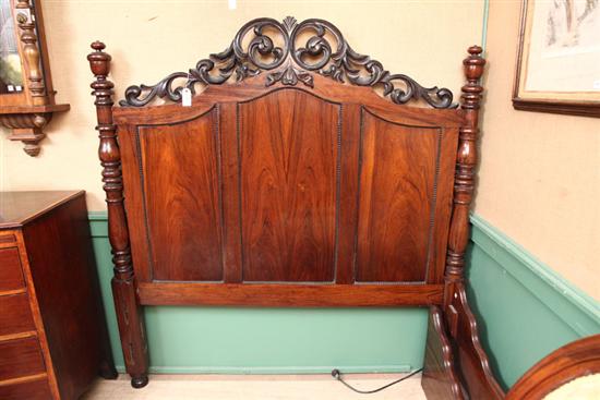 BED. Rosewood with scroll carved crest