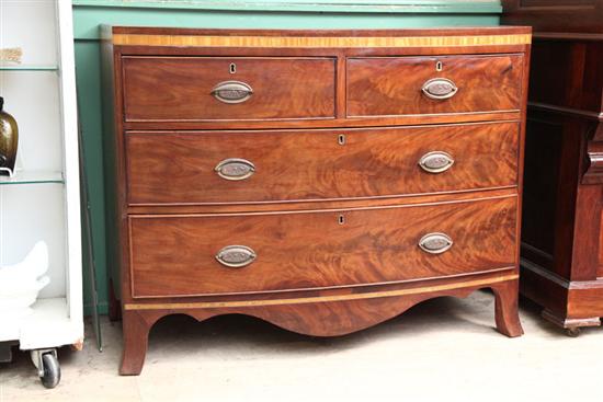 BOWFRONT CHEST OF DRAWERS. Mahogany