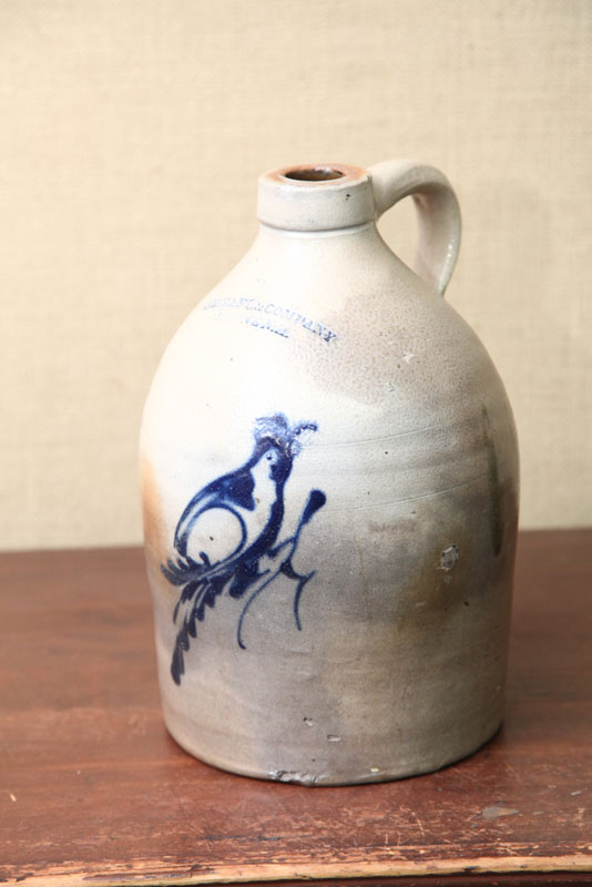 STONEWARE JUG. With cobalt bird decor