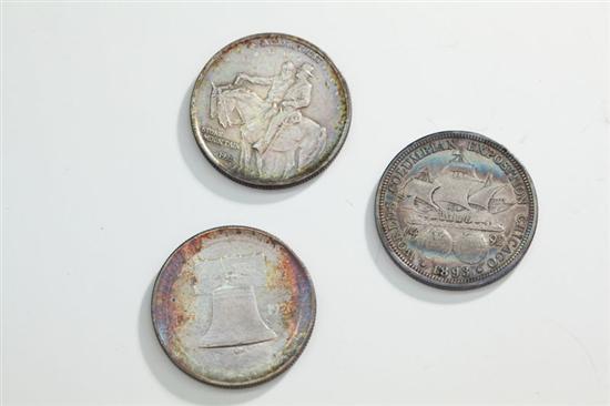 THREE SILVER HALF-DOLLARS. Columbian