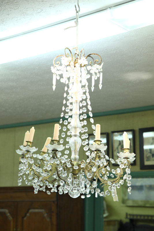 CHANDELIER. Brass with molded glass