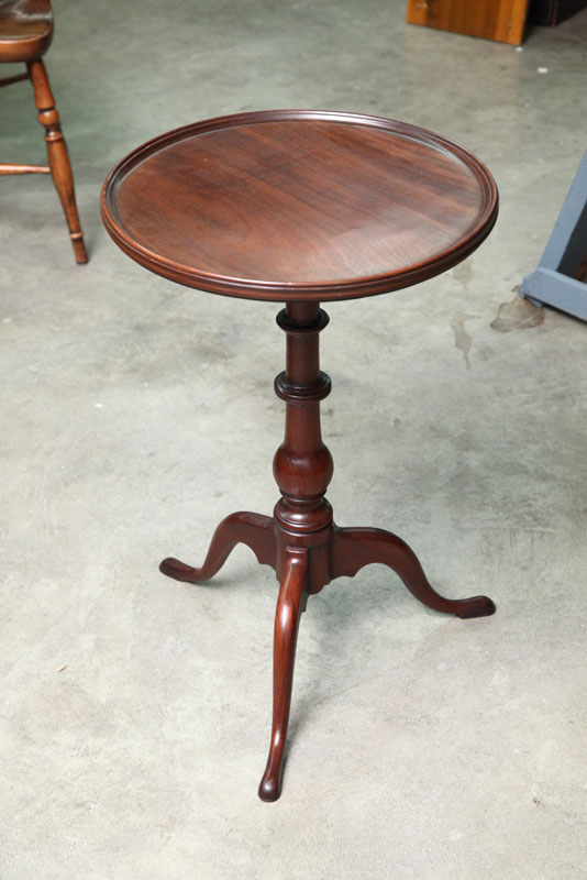 CANDLE STAND. Walnut with a dish