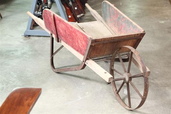 PAINTED WHEEL BARROW. Red painted