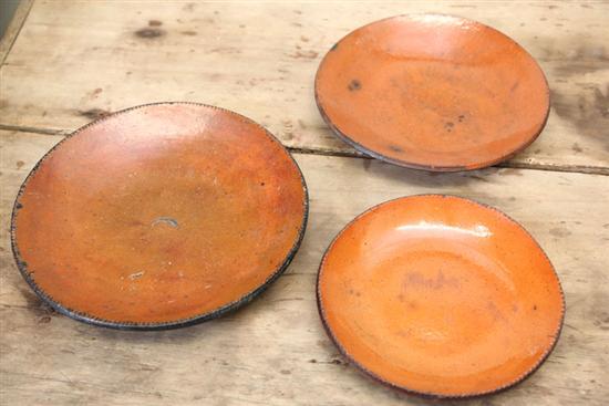 THREE REDWARE PLATES. All with coggled