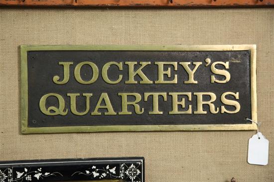 ''JOCKEY'S QUARTERS'' SIGN. Brass