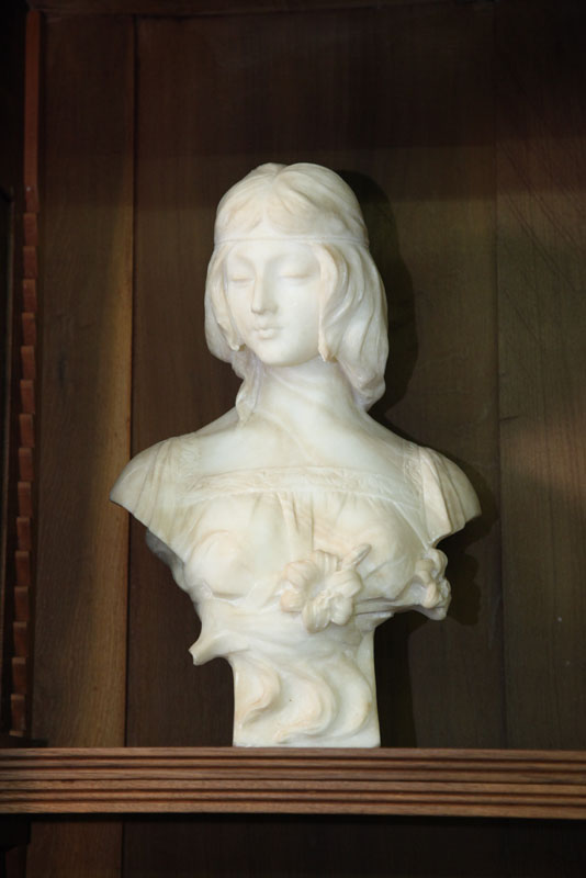 MARBLE BUST. Classical woman with floral