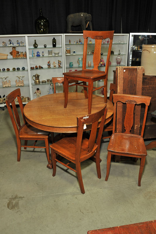 SEVEN PIECE DINING ROOM SET. Oak pedastal