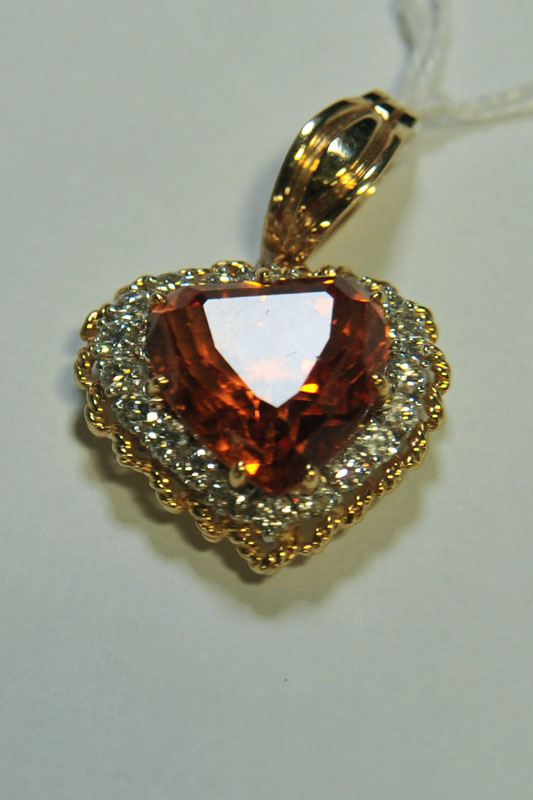 DIAMOND HEART PENDANT. Central