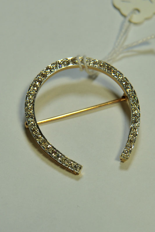 DIAMOND BROOCH. In the form of