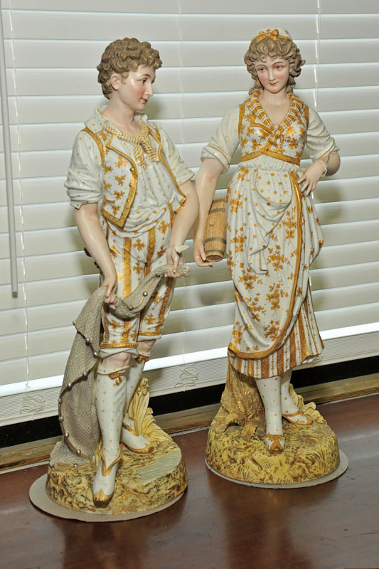 TWO LARGE PORCELAIN FIGURINES. Male