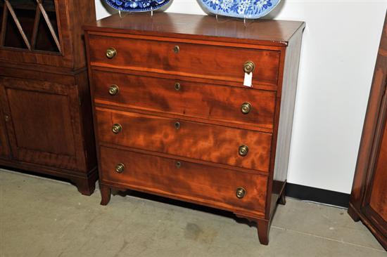 CHEST OF DRAWERS. Cherry with flame