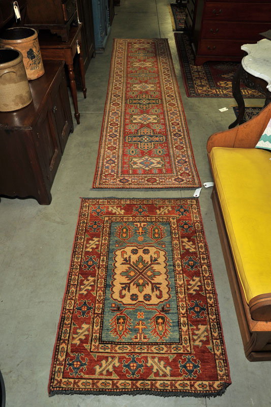 TWO ORIENTAL STYLE AREA RUGS. A