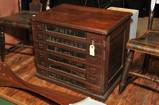 SPOOL CABINET. Walnut  six drawer