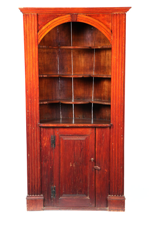 BARREL-BACK CORNER CUPBOARD.  American