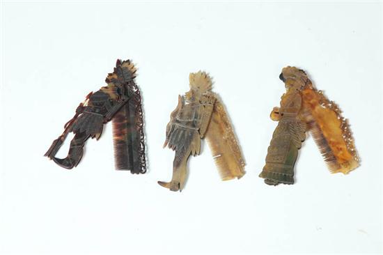 THREE TORTOISE SHELL COMBS Probably 115194