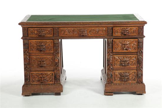 CARVED DESK.  Early 20th century