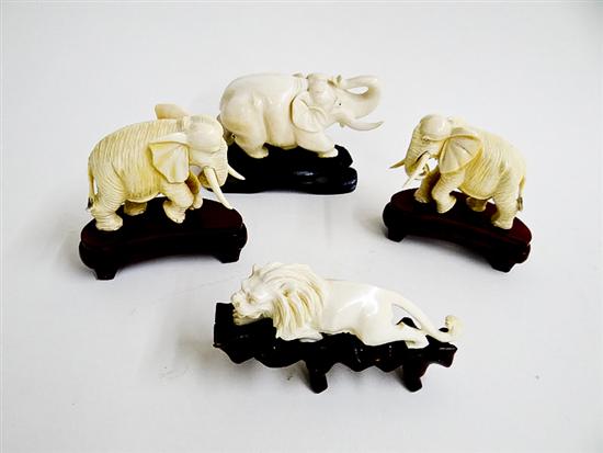 FOUR CARVED IVORY AMINALS.  Asia