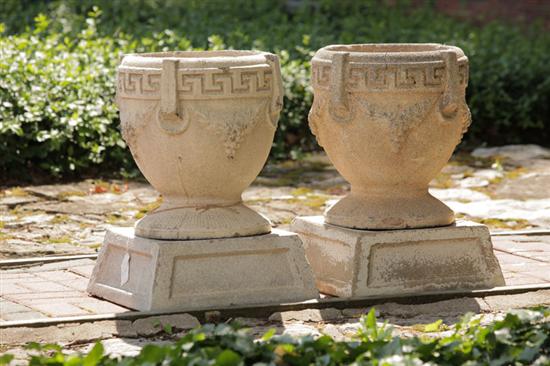 PAIR OF CEMENT GARDEN URNS.  Found