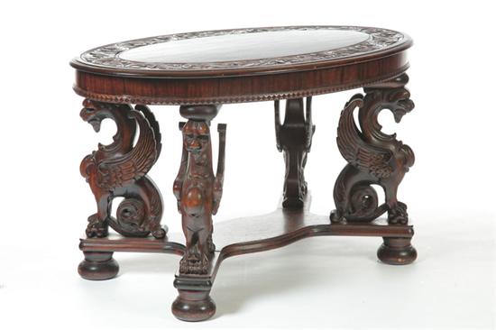 CARVED CENTER TABLE ATTRIBUTED TO RJ