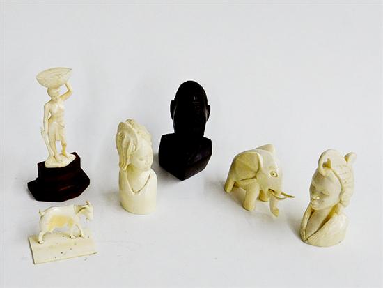 GROUP OF IVORY CARVINGS AND A WOODEN