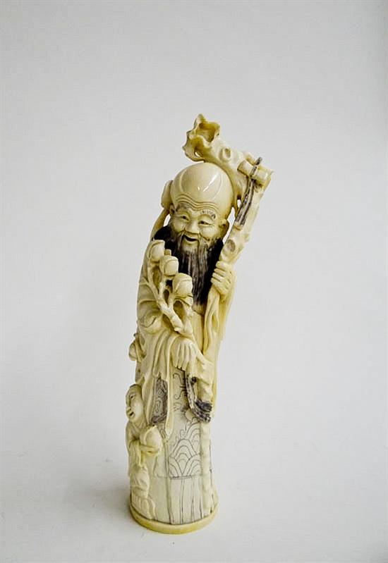 CARVED IVORY FIGURE.  China  early