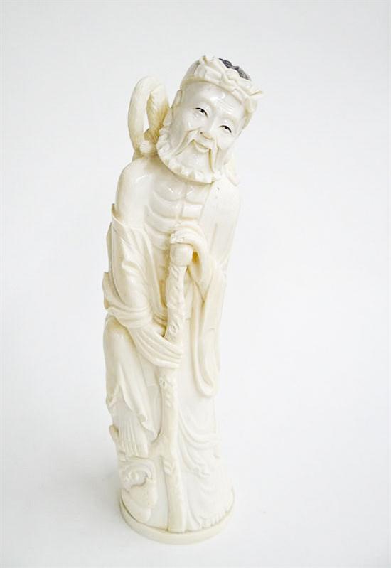 CARVED IVORY FIGURE.  China  early