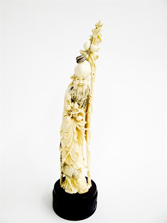CARVED IVORY FIGURE.  China  early