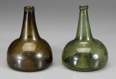 Two 18th century glass bottles:
