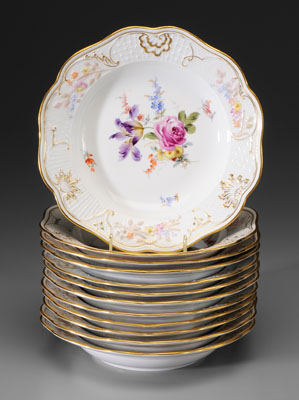 Twelve Meissen porcelain bowls: shallow