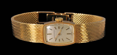 Lady s Movado gold wristwatch  1149b9