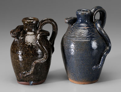 Two B. B. Craig snake jugs (Burlon