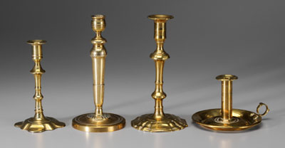 Four brass candleholders one with 117a02