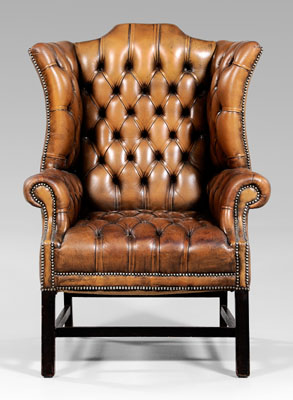 Chippendale style tufted leather-upholstered