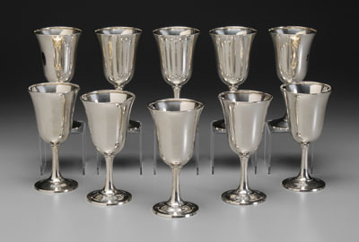 Ten sterling goblets: flared rims,