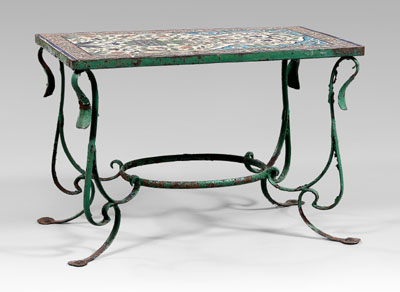 Persian tile and wrought iron table,