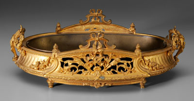 Oval gilt bronze footed planter,