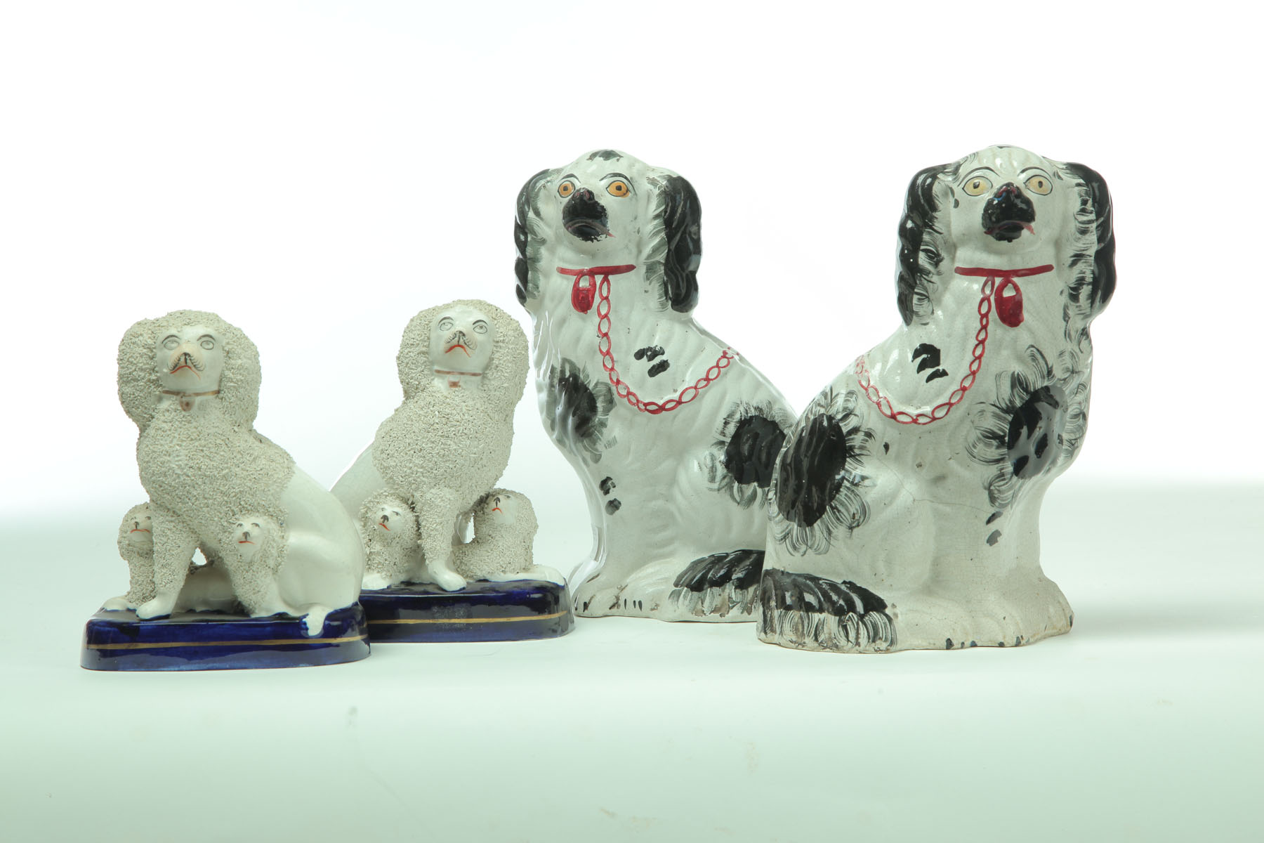 TWO PAIR OF STAFFORDSHIRE DOGS  117128