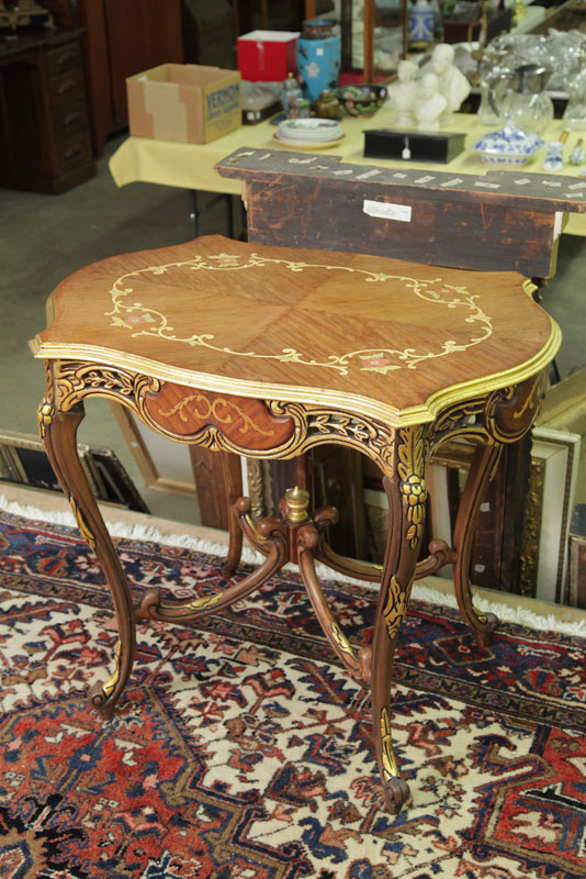 SIDE TABLE. Ornate table with gilt accents