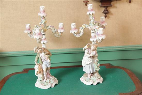 PAIR OF FIGURAL CANDELABRA. Bisque