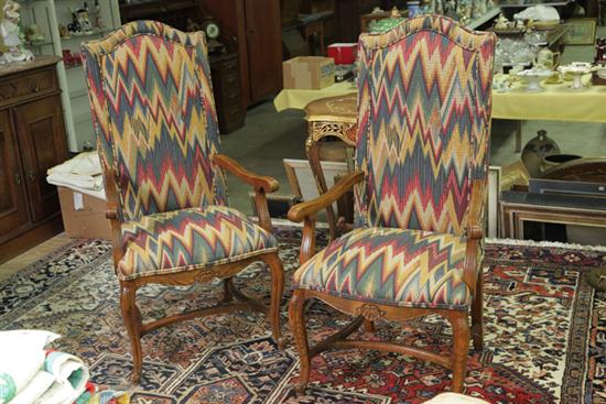 PAIR OF ARM CHAIRS. Oak frames