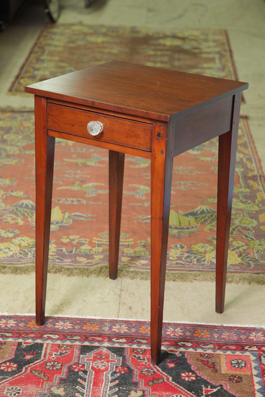 ONE DRAWER STAND. Walnut having