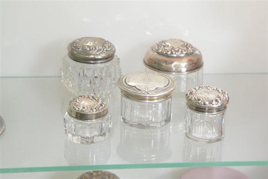 FIVE SMALL GLASS DRESSER JARS WITH