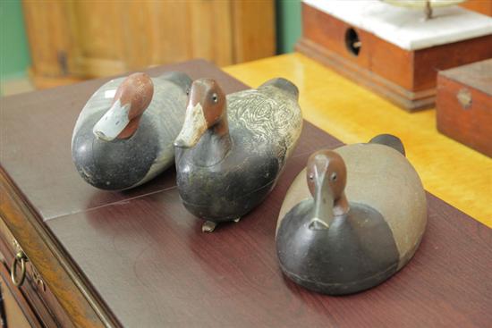 THREE DUCK DECOYS. All painted Redhead