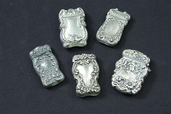 FIVE STERLING SILVER MATCH SAFES.