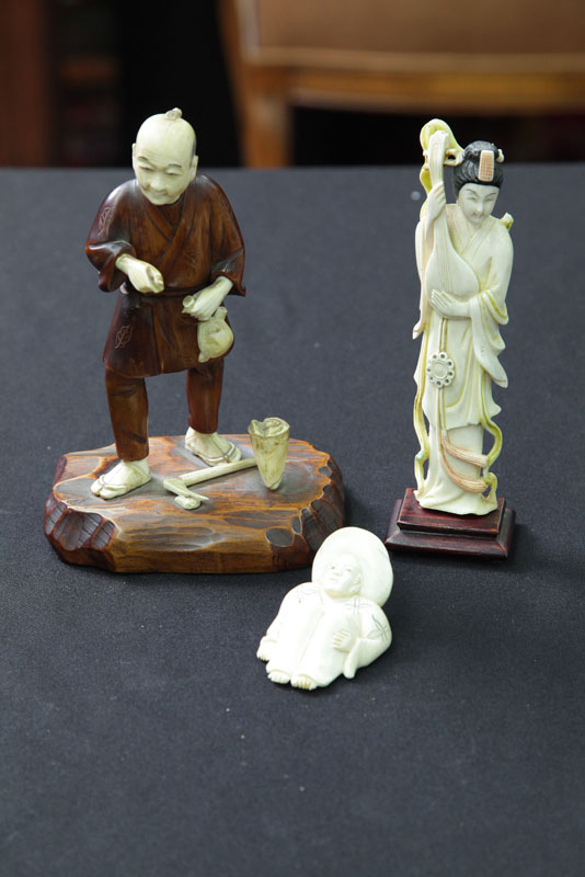THREE CARVED IVORY FIGURES Including 117331