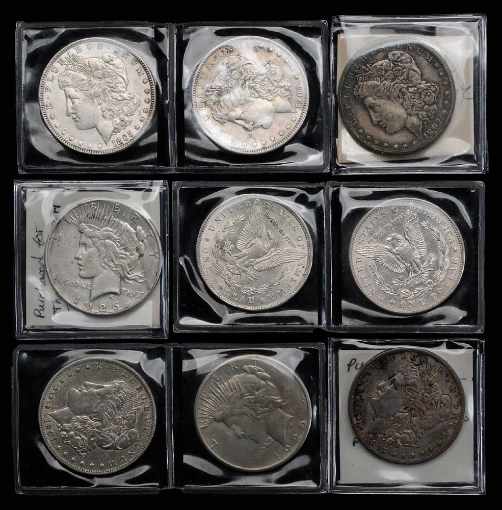 Nine U S Silver Dollars seven 11ab30