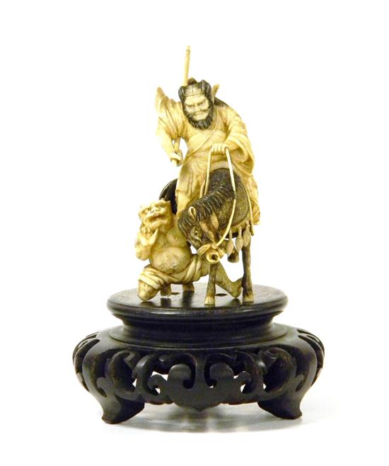 Carved ivory figure of a warrior/samurai