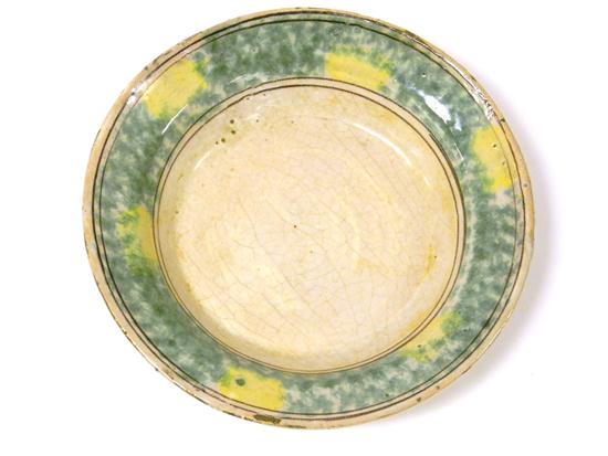 Tin glazed spongeware decorated 1211ad